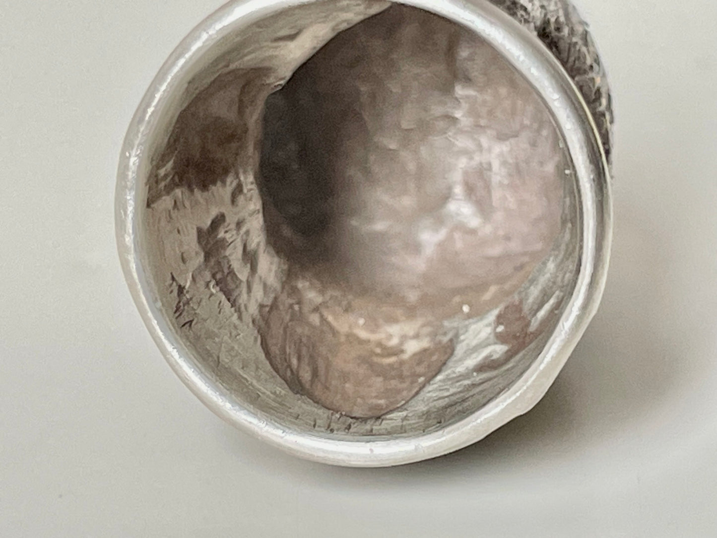 Ruby-eyed silver peasant head sewing thimble wearing Faberge mark