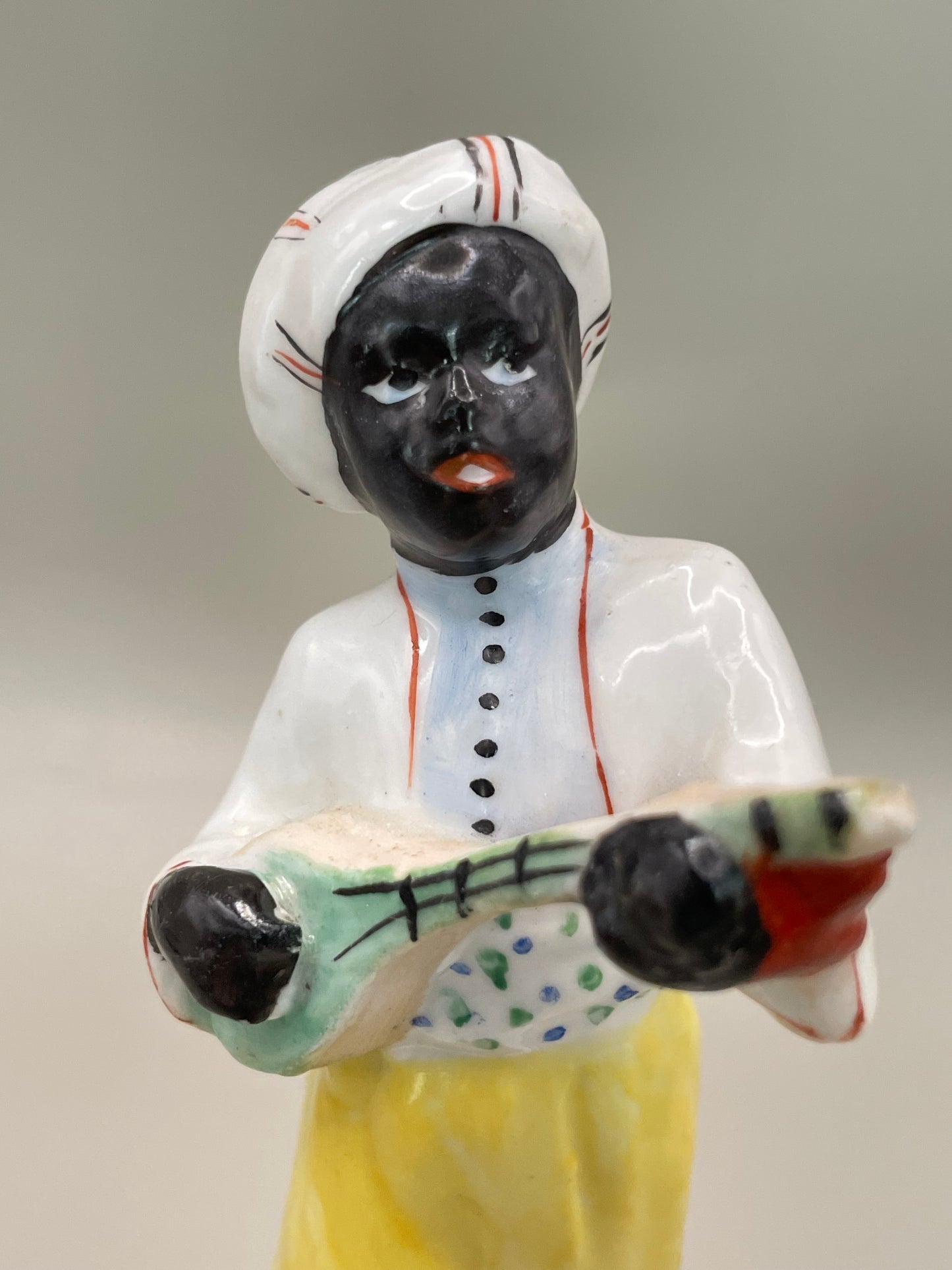 Arabian boy with banjo figurine by Gorodnitsa