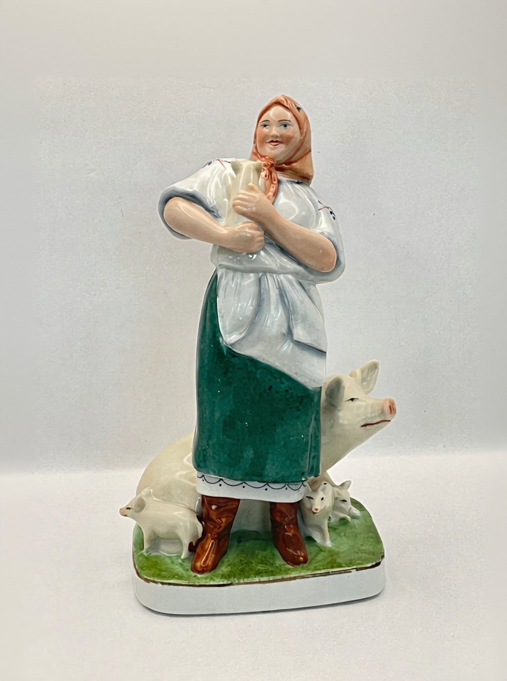 Farm woman with pig figurine by Gorodnitsa from 30ies