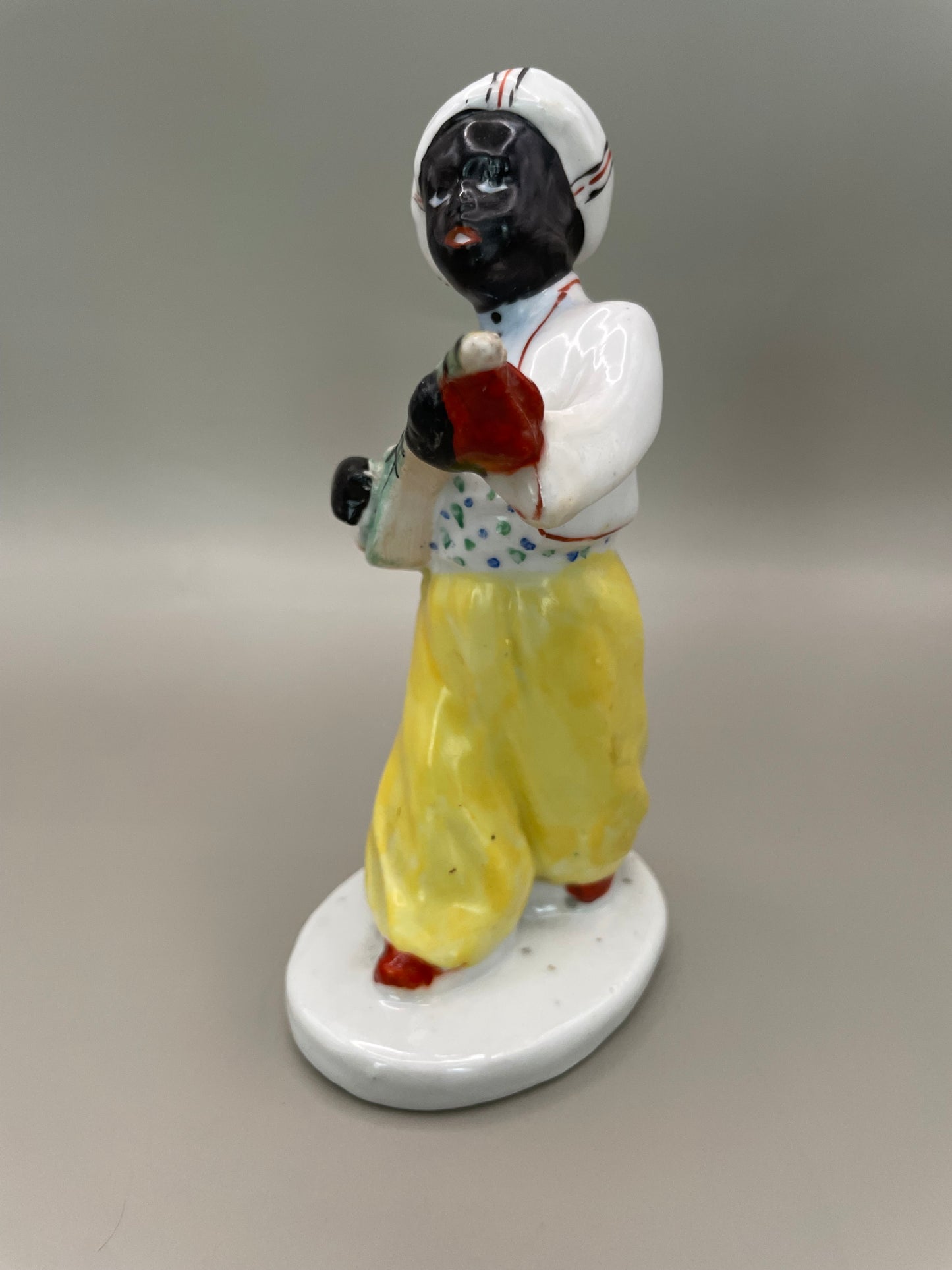 Arabian boy with banjo figurine by Gorodnitsa