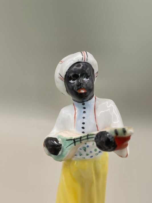 Arabian boy with banjo figurine by Gorodnitsa