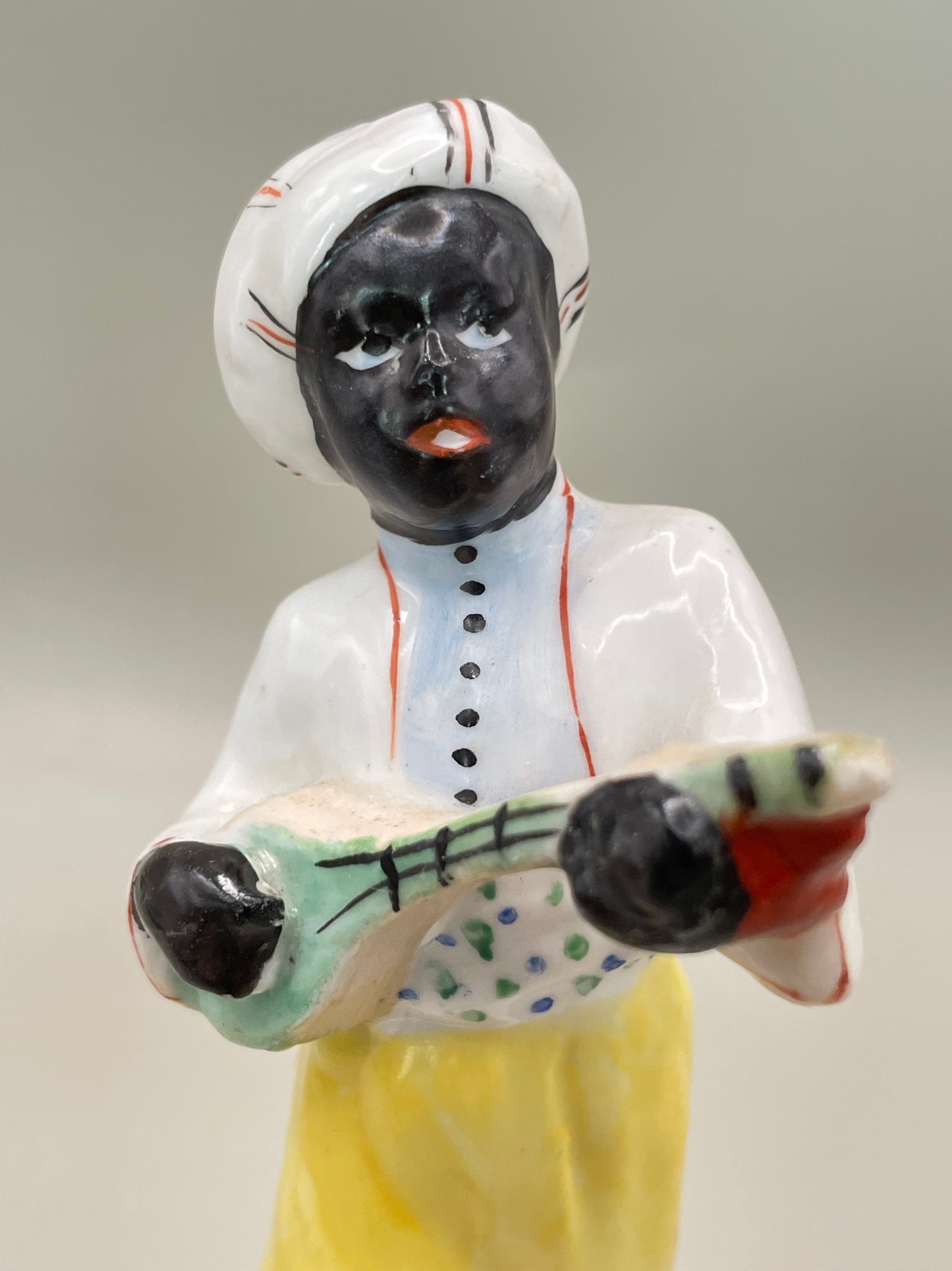 Arabian boy with banjo figurine by Gorodnitsa