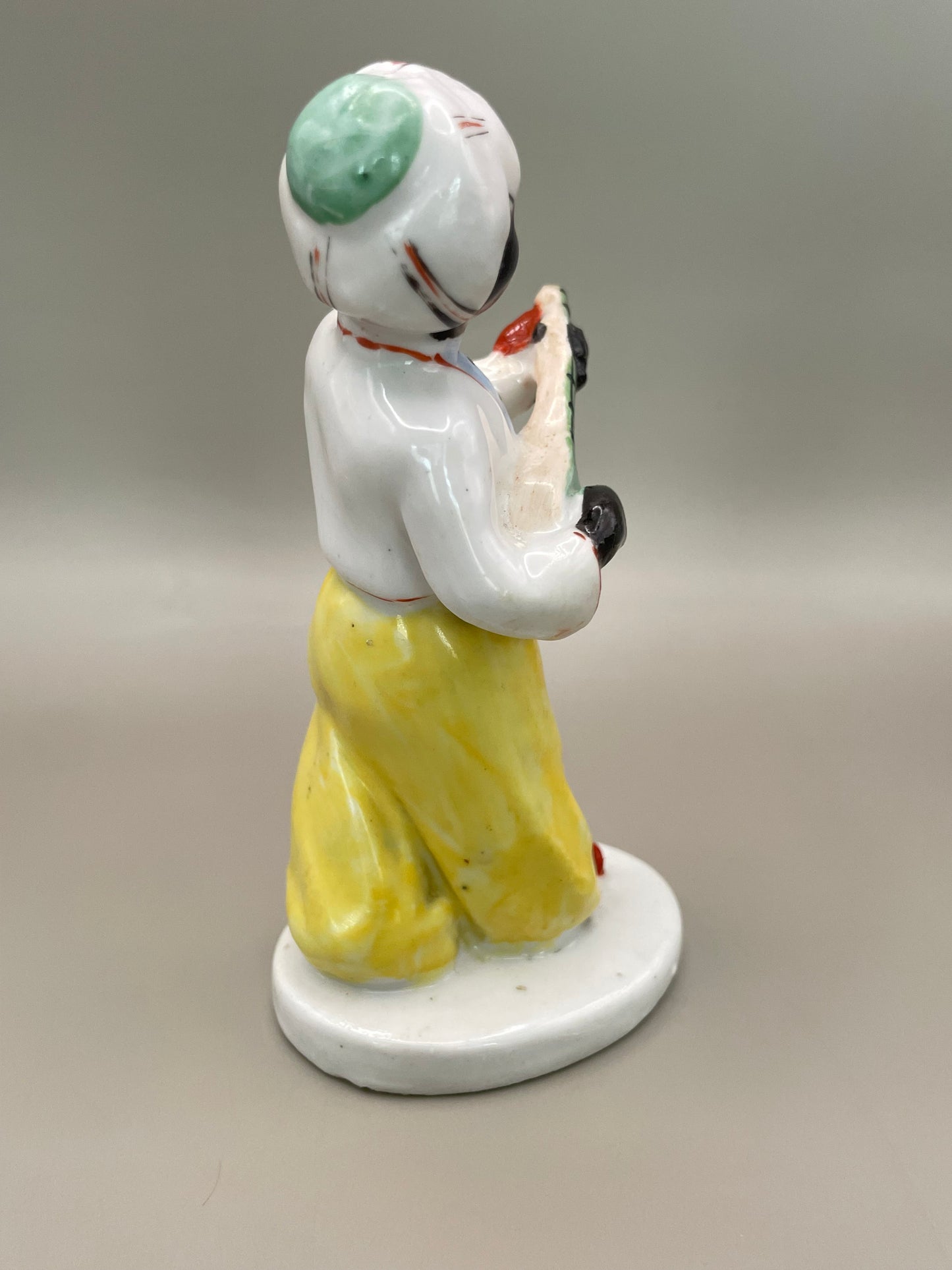 Arabian boy with banjo figurine by Gorodnitsa