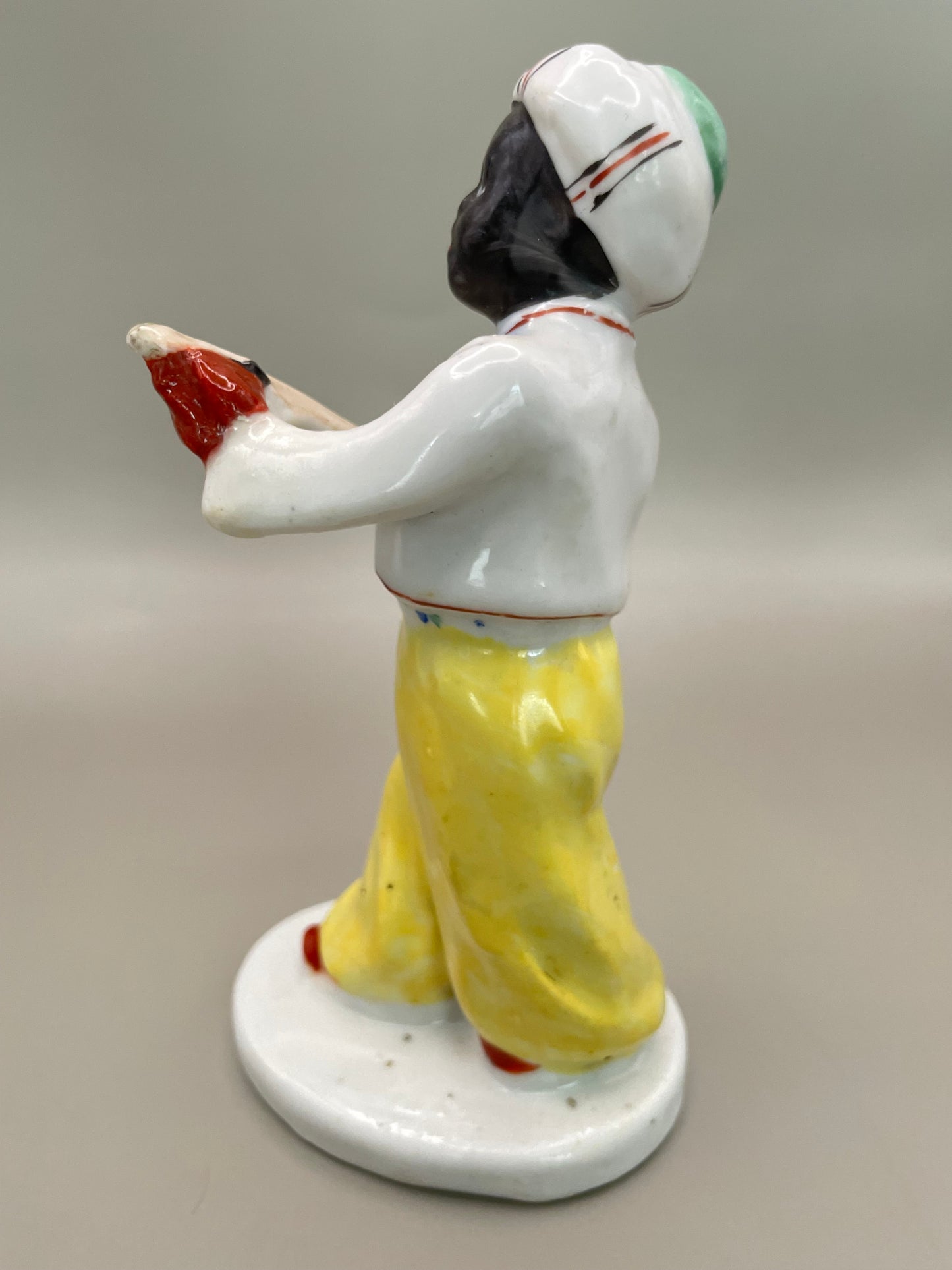 Arabian boy with banjo figurine by Gorodnitsa