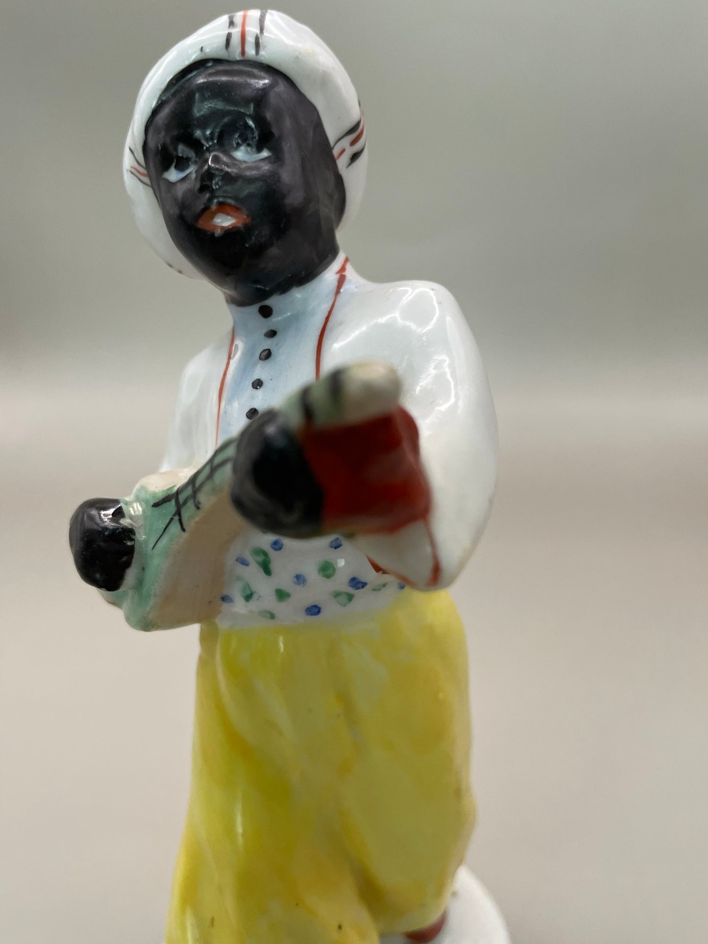 Arabian boy with banjo figurine by Gorodnitsa