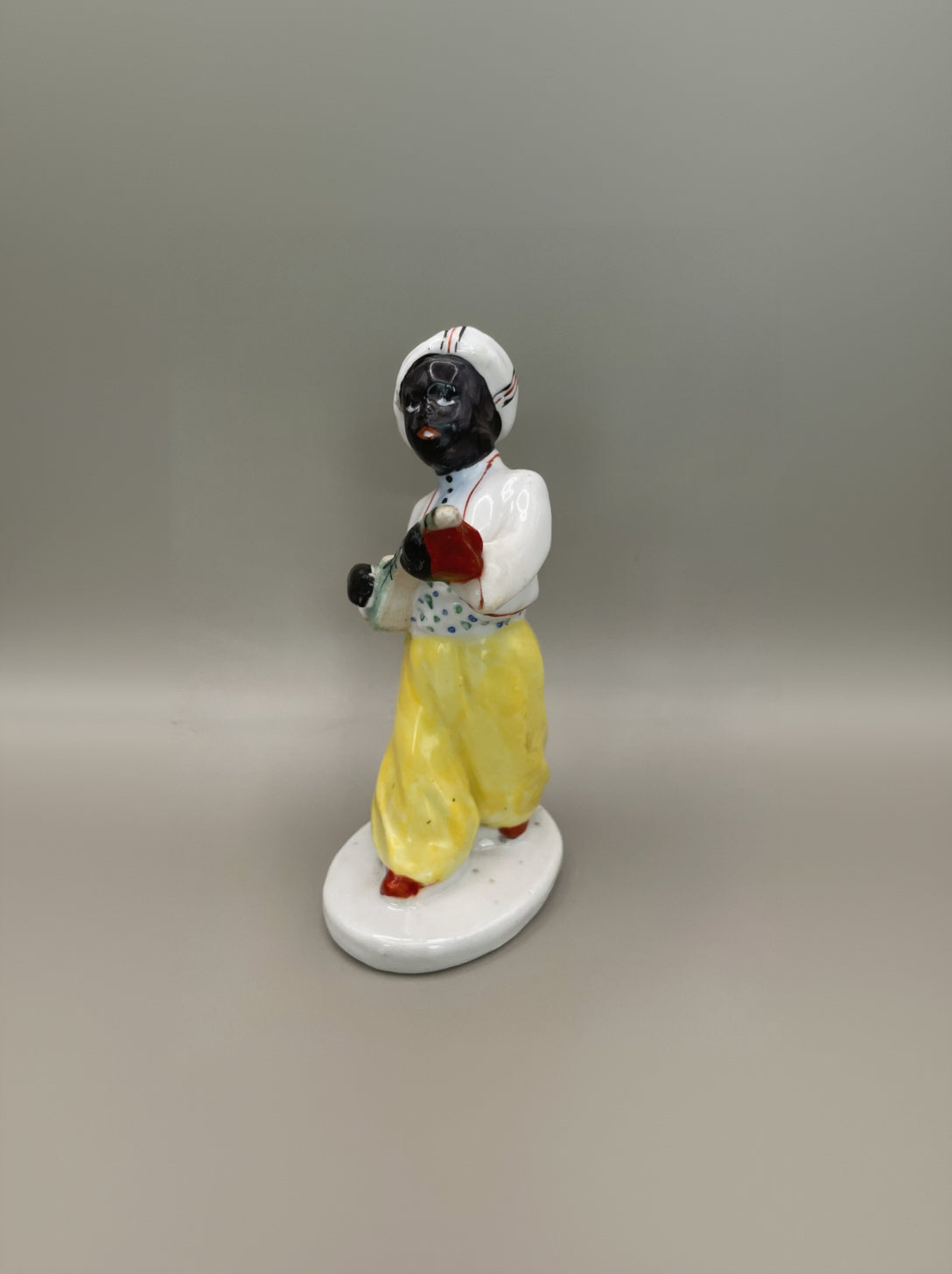 Arabian boy with banjo figurine by Gorodnitsa