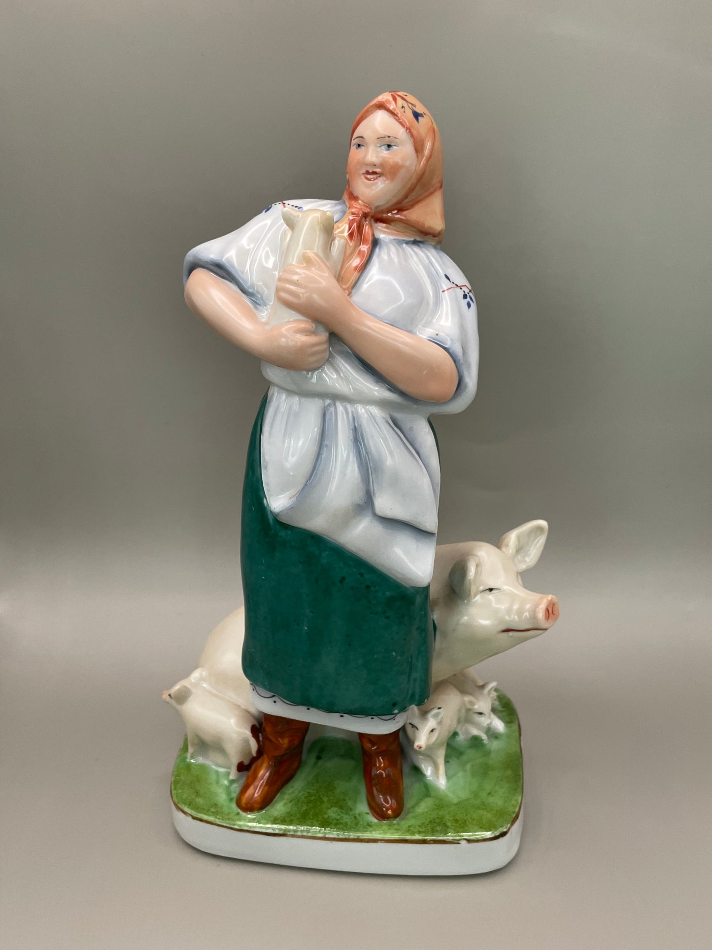Farm woman with pig figurine by Gorodnitsa from 30ies