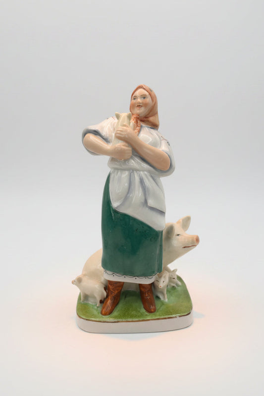 Farm woman with pig figurine by Gorodnitsa from 30ies