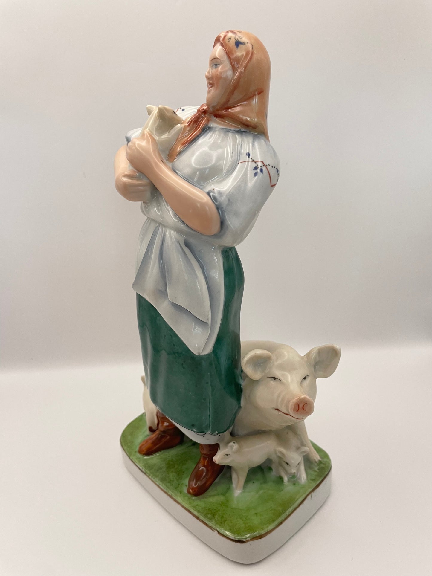 Farm woman with pig figurine by Gorodnitsa from 30ies