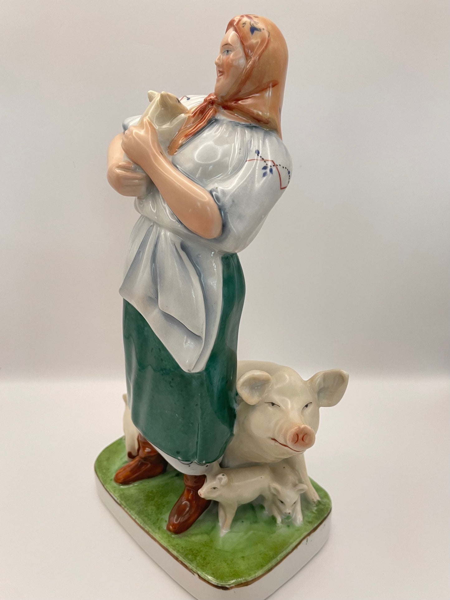 Farm woman with pig figurine by Gorodnitsa from 30ies