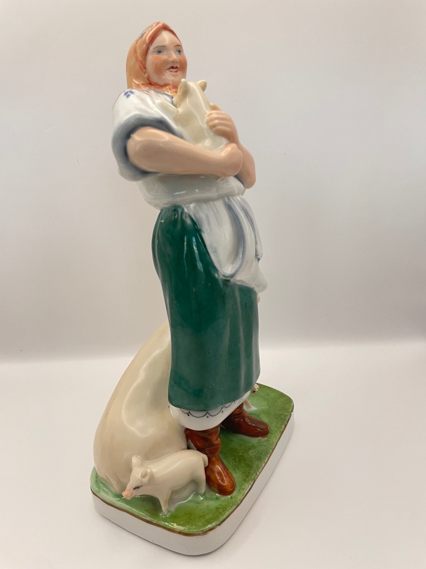 Farm woman with pig figurine by Gorodnitsa from 30ies