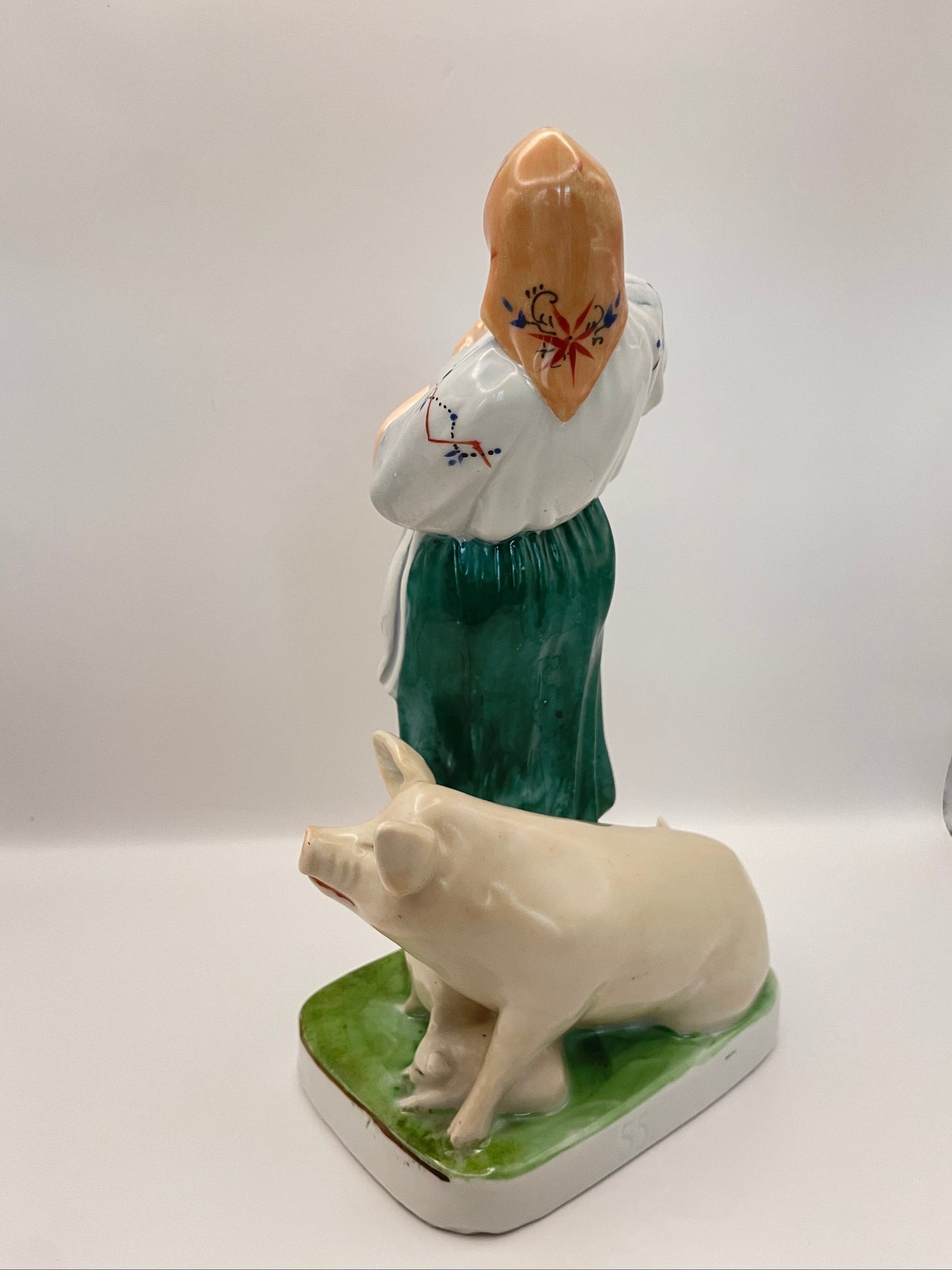 Farm woman with pig figurine by Gorodnitsa from 30ies