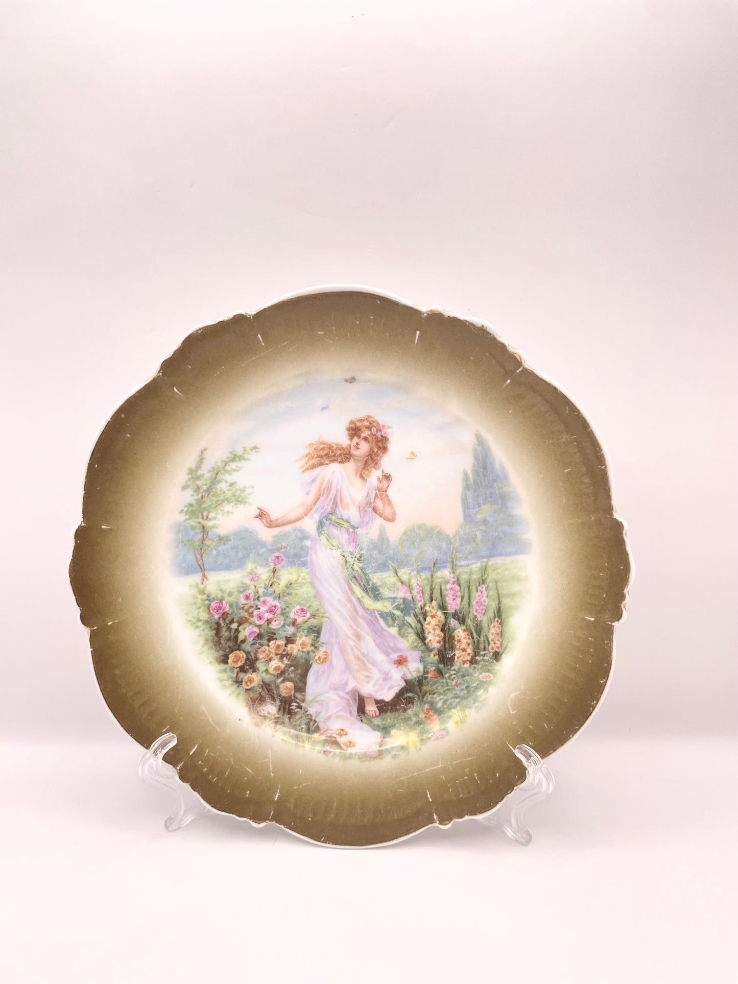 Kuznetsov’s plate depicting lady with butterflies