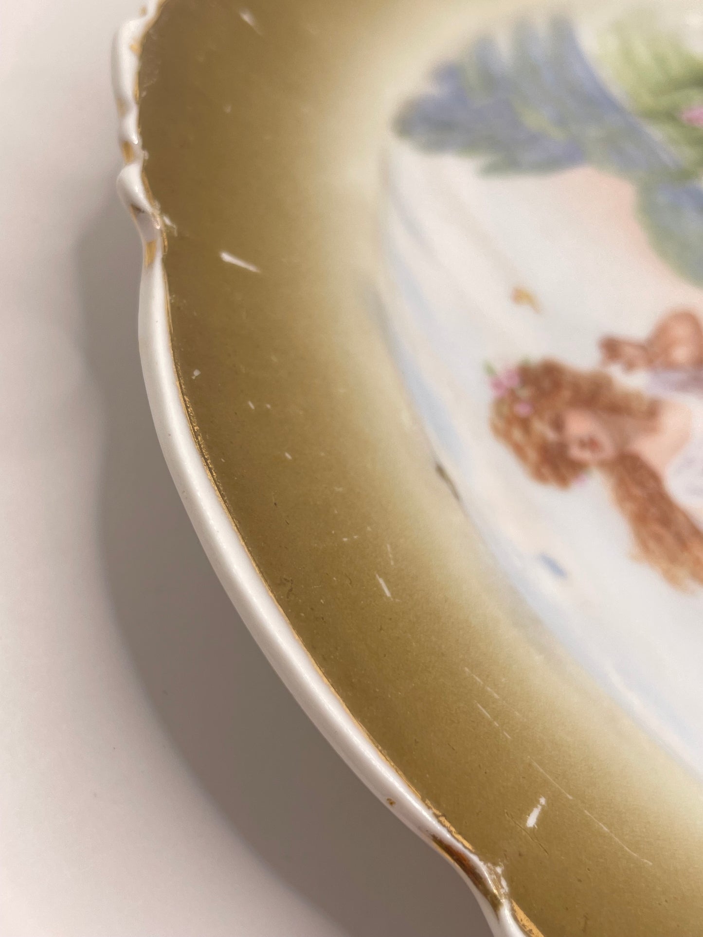 Kuznetsov’s plate depicting lady with butterflies