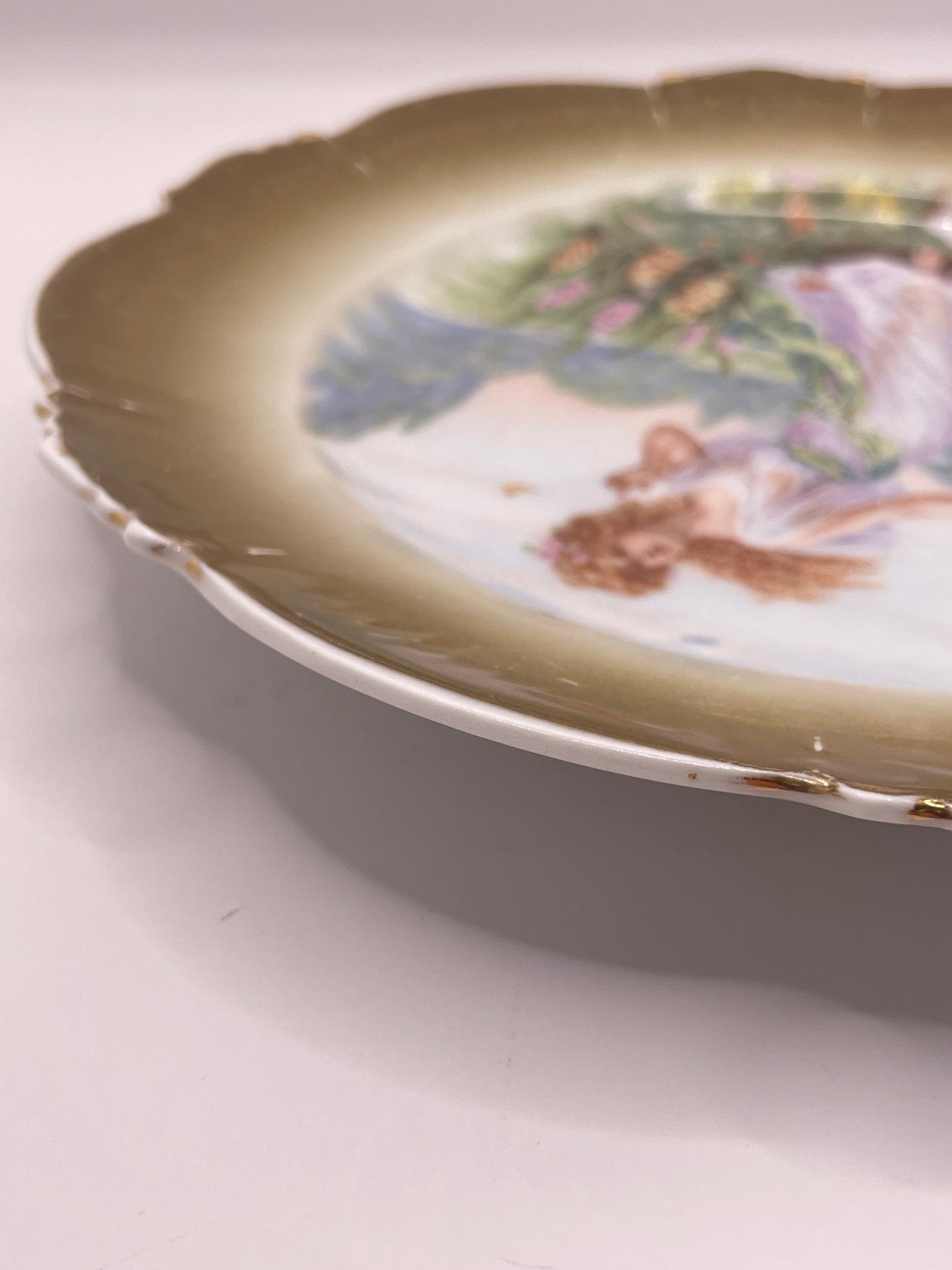 Kuznetsov’s plate depicting lady with butterflies