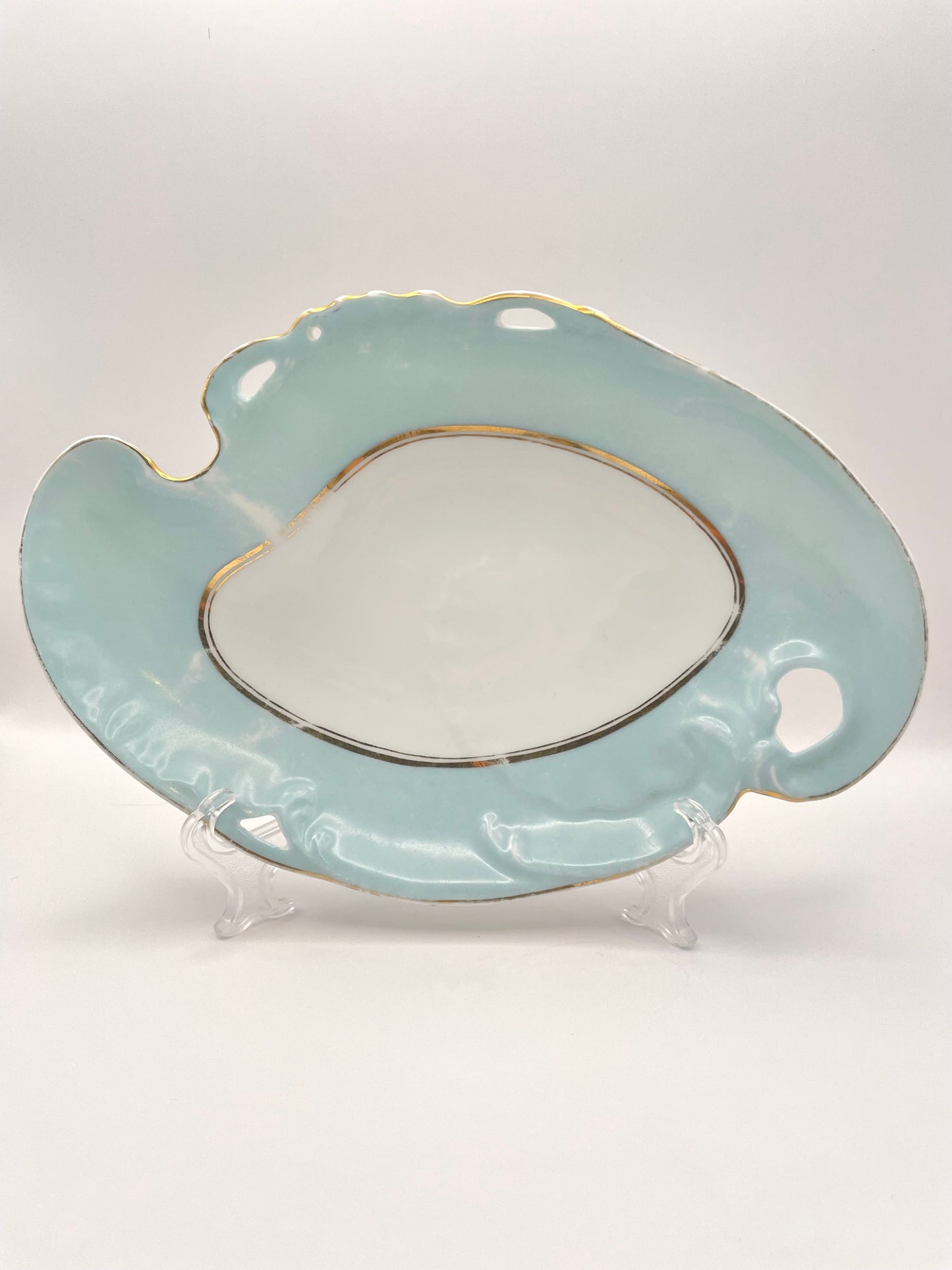 Figural tsarist era plate by M.S. Kuznetsov