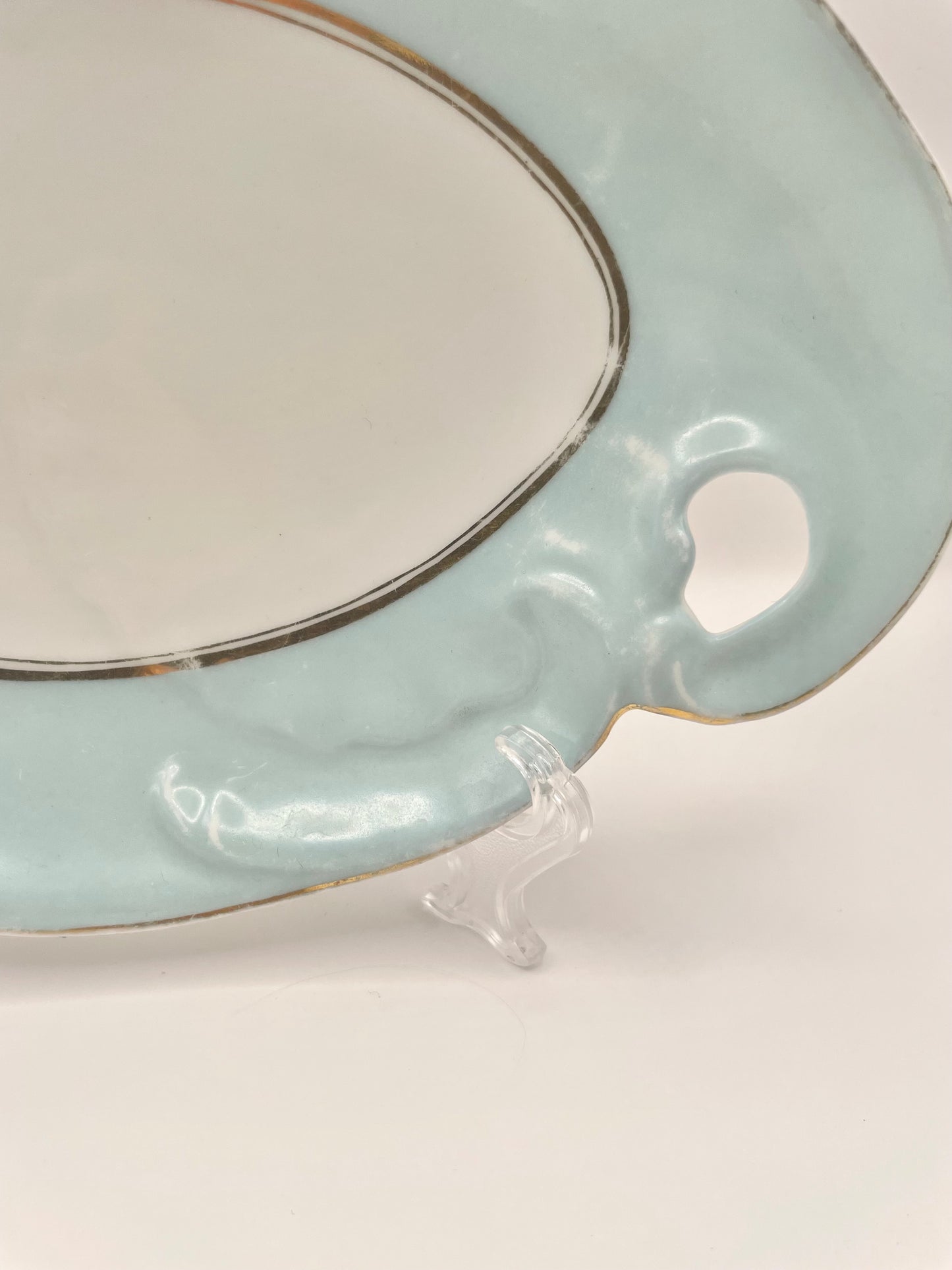 Figural tsarist era plate by M.S. Kuznetsov