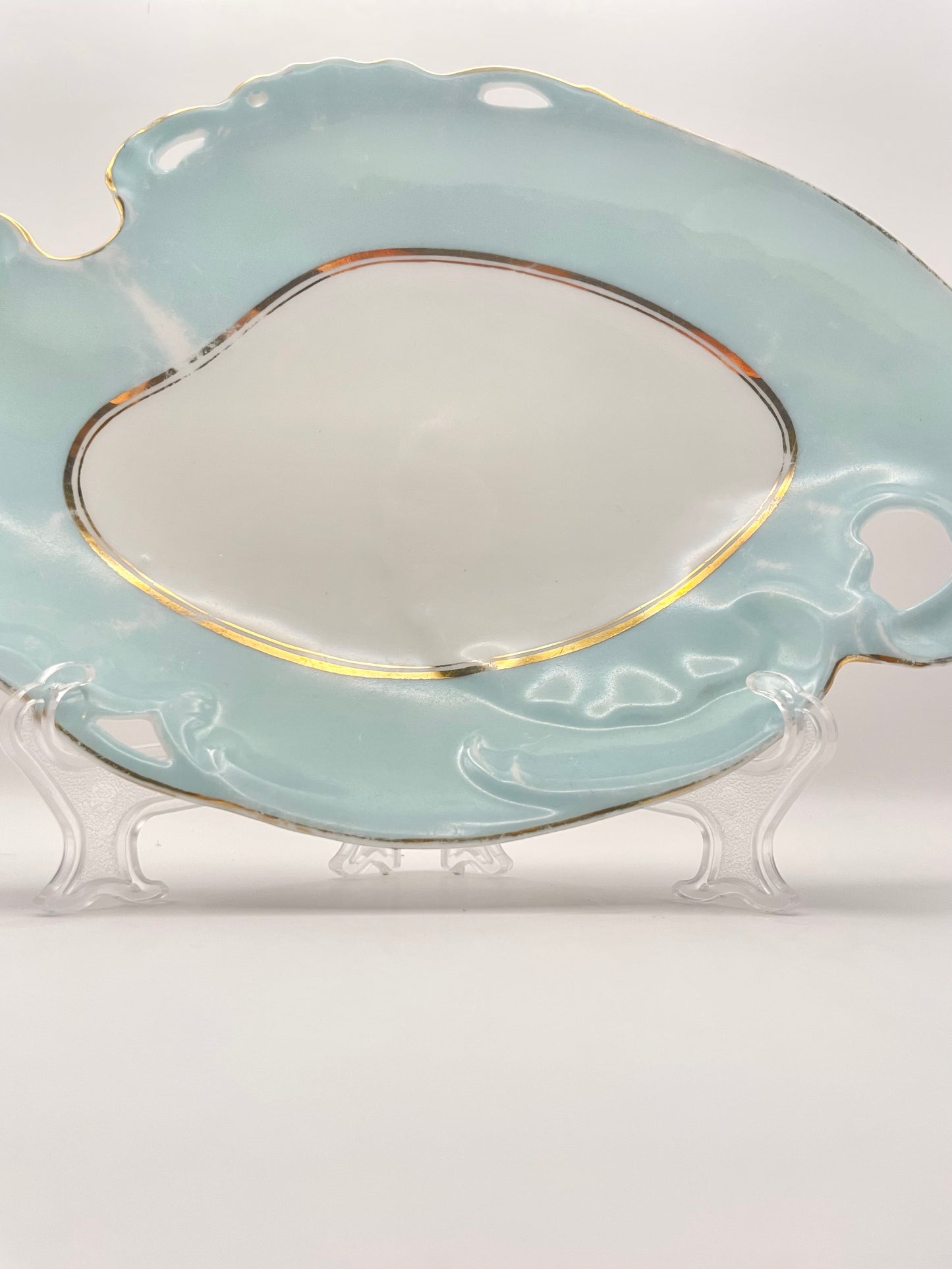 Figural tsarist era plate by M.S. Kuznetsov