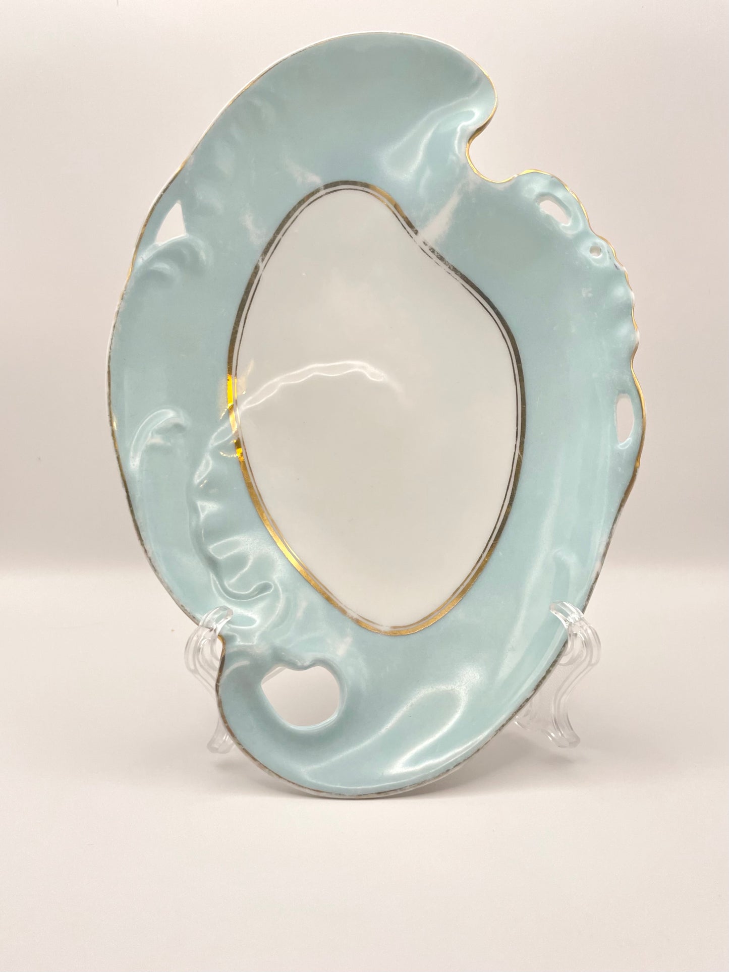 Figural tsarist era plate by M.S. Kuznetsov