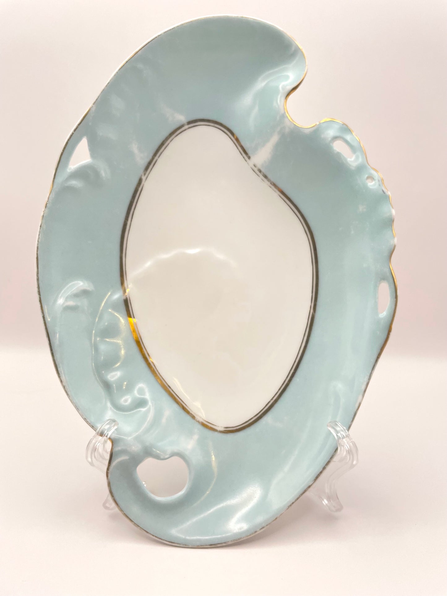 Figural tsarist era plate by M.S. Kuznetsov