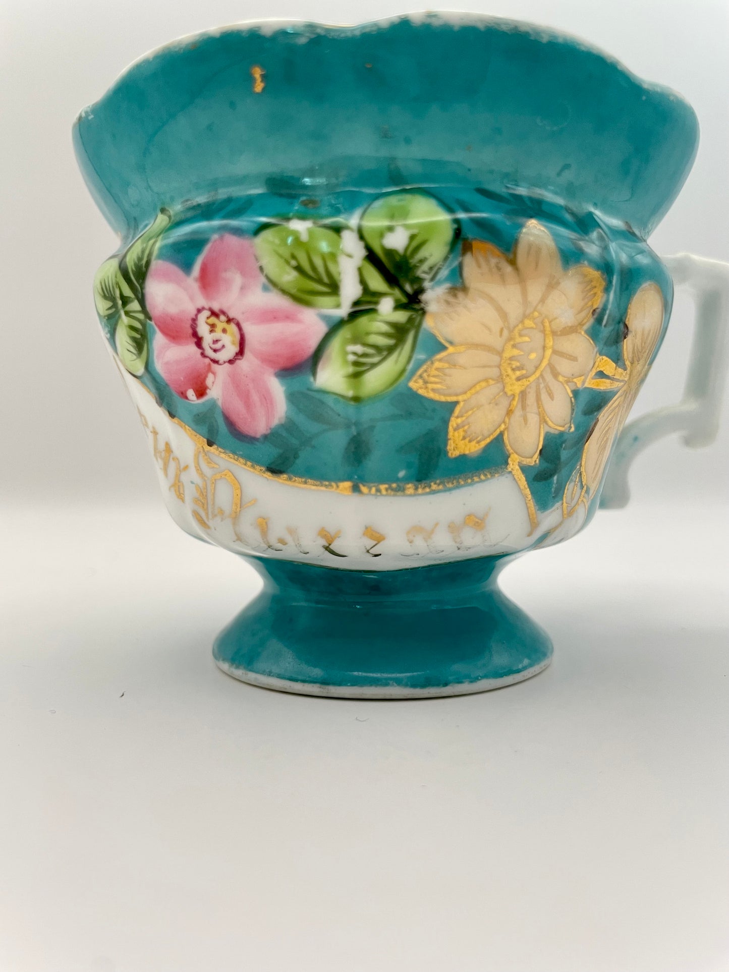 Hand-painted porcelain tea cup produced by Kuznetsov factory