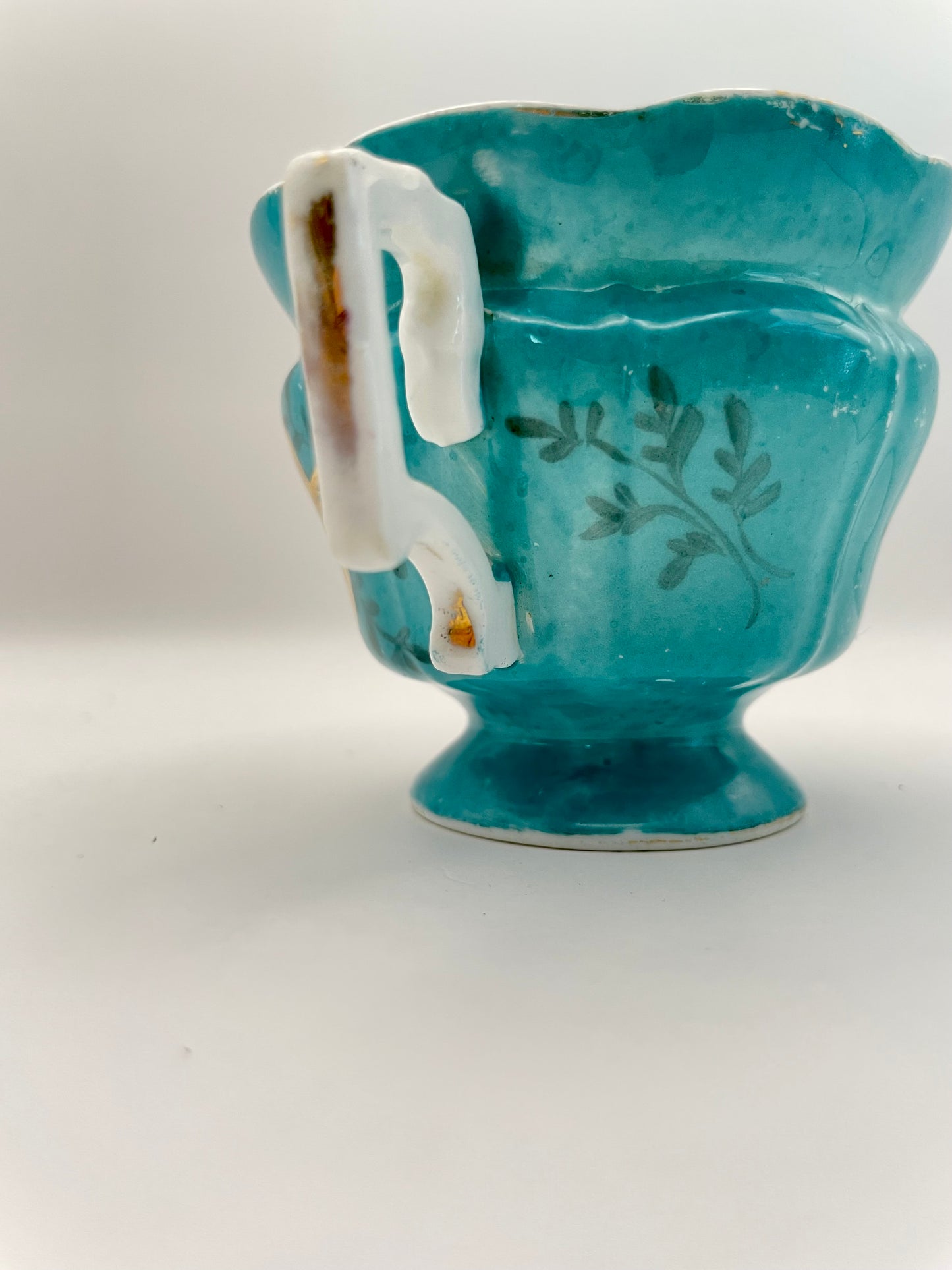 Hand-painted porcelain tea cup produced by Kuznetsov factory