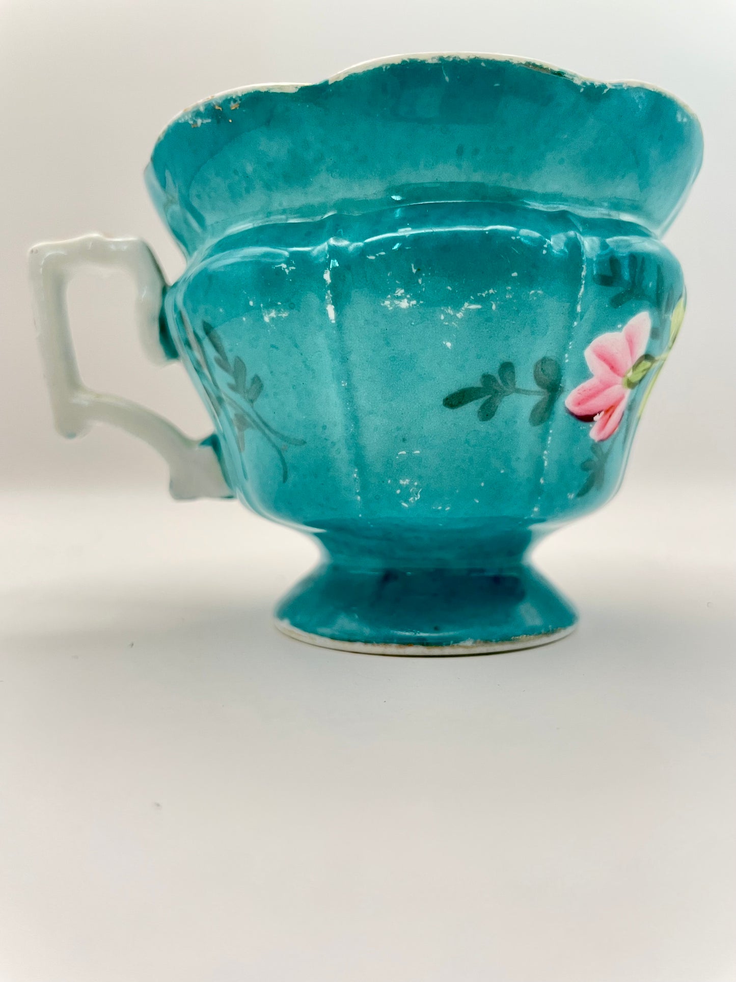 Hand-painted porcelain tea cup produced by Kuznetsov factory