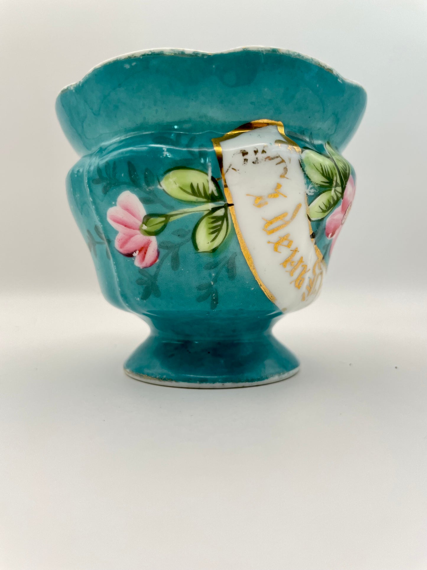 Hand-painted porcelain tea cup produced by Kuznetsov factory