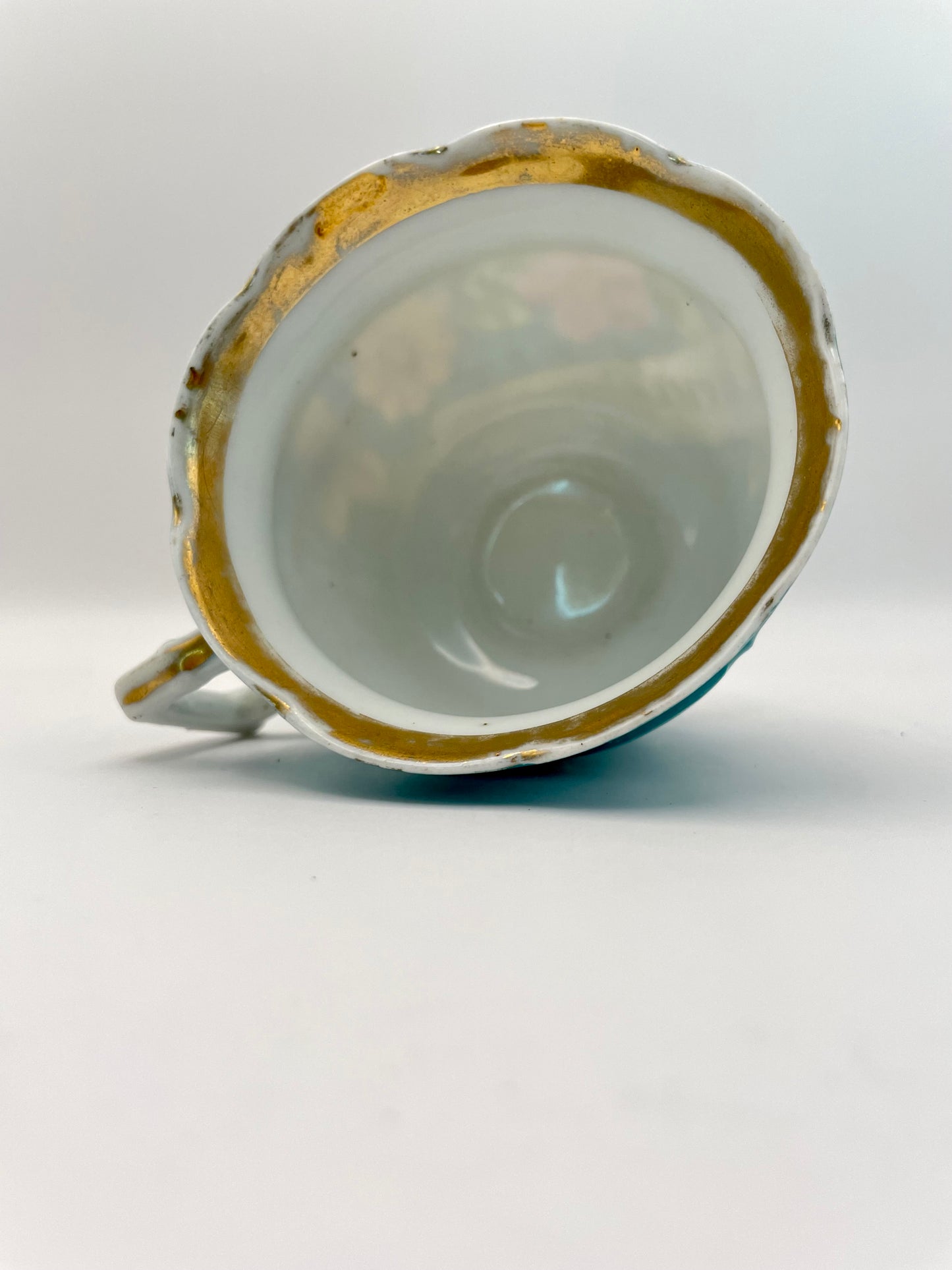 Hand-painted porcelain tea cup produced by Kuznetsov factory