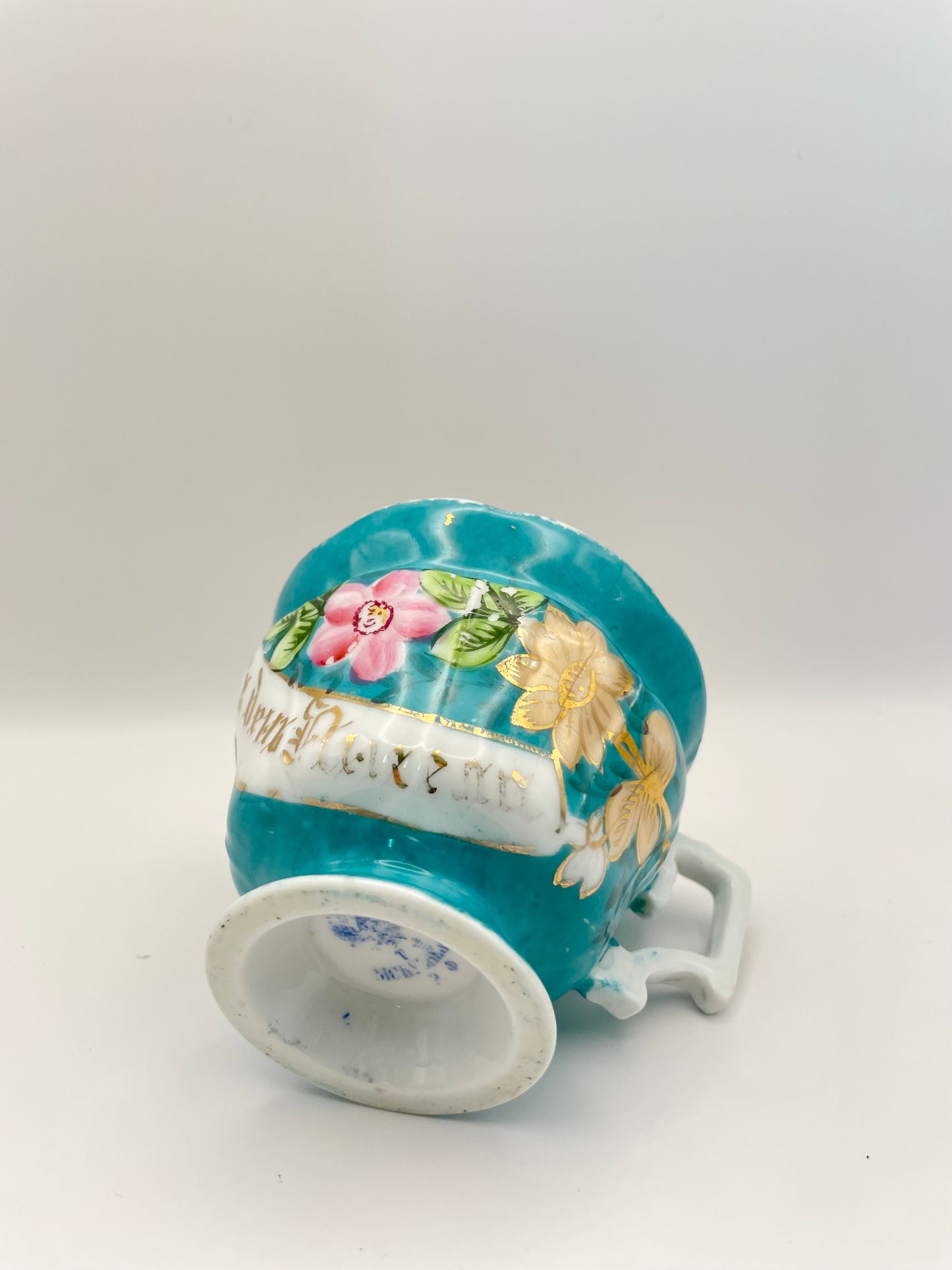 Hand-painted porcelain tea cup produced by Kuznetsov factory