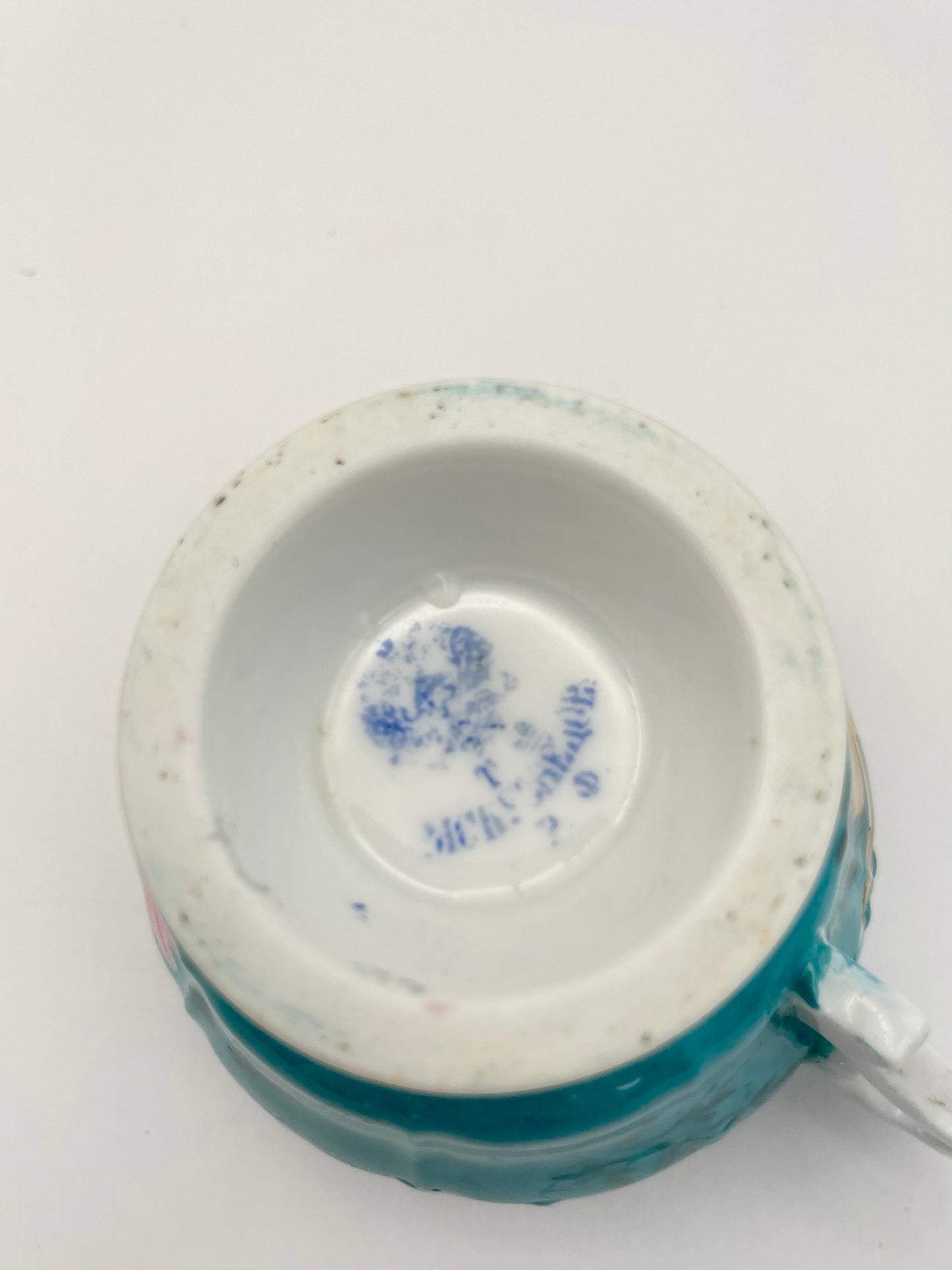 Hand-painted porcelain tea cup produced by Kuznetsov factory