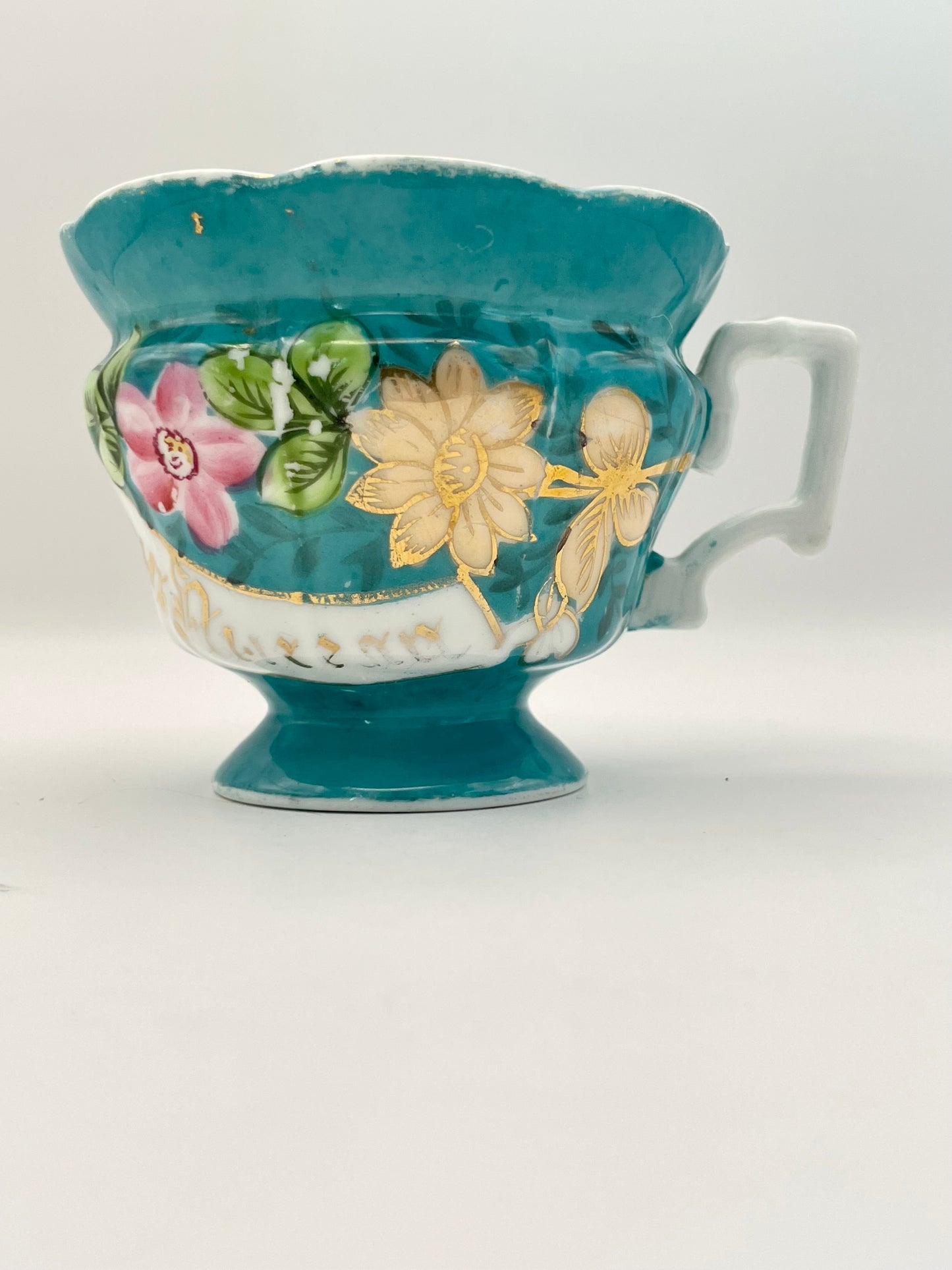 Hand-painted porcelain tea cup produced by Kuznetsov factory