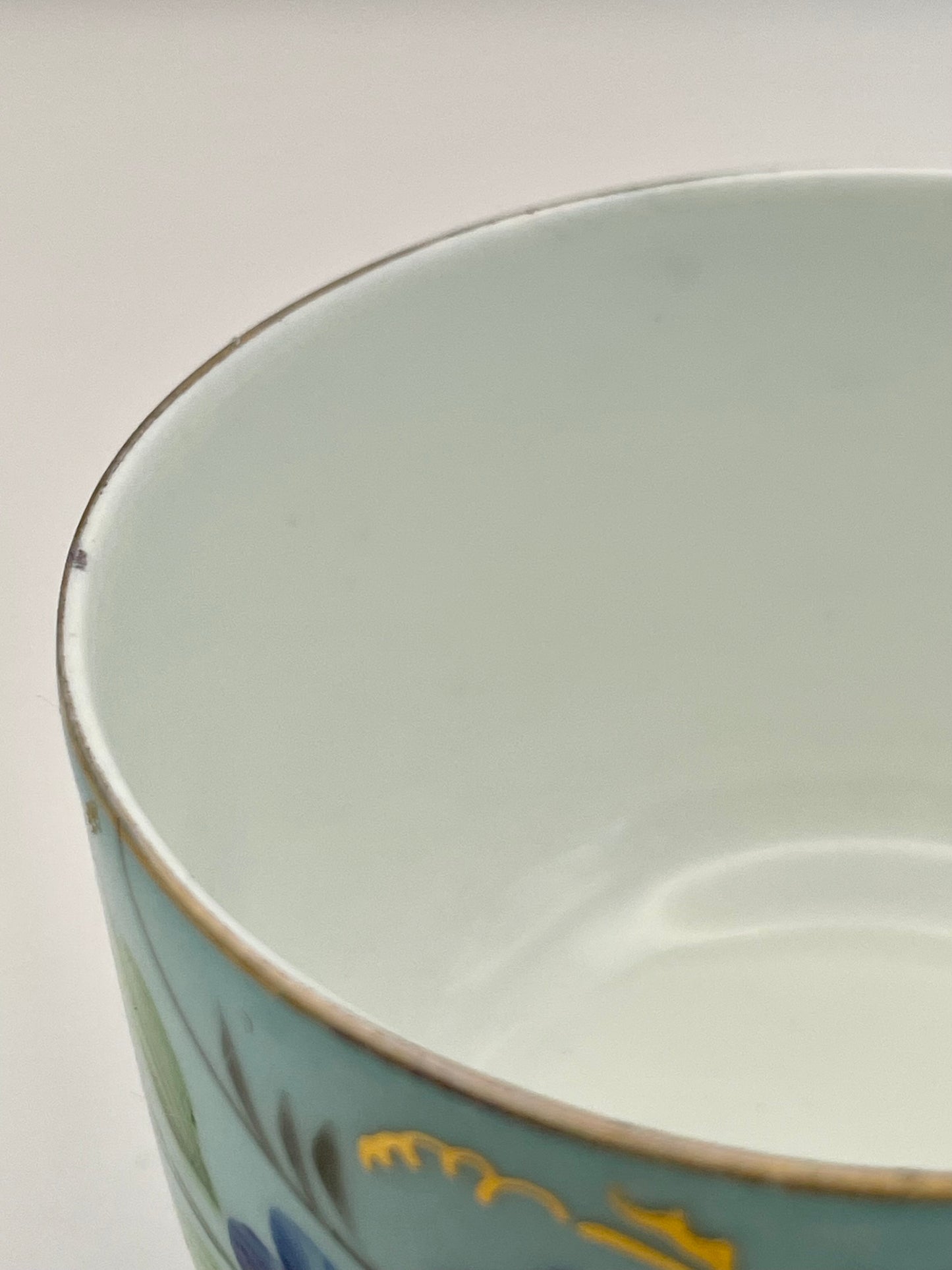 Hand-painted lace-footed porcelain tea cup produced by Kuznetsov