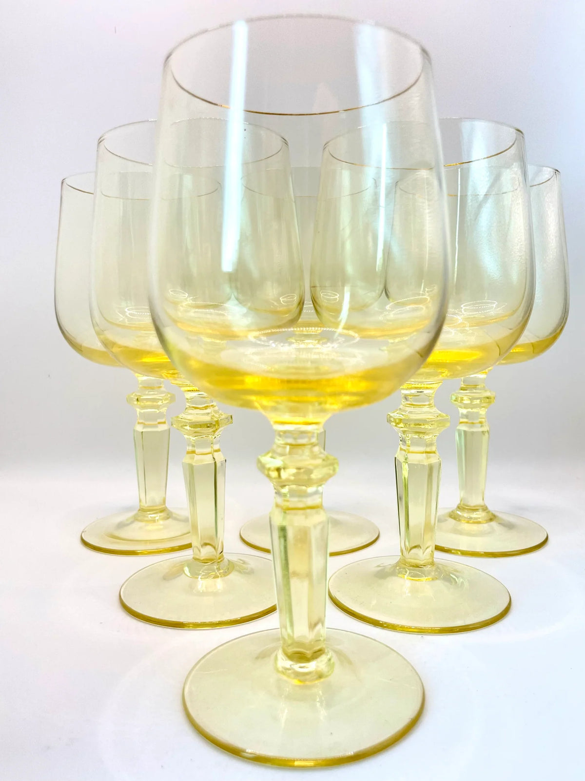 Six yellow wine glasses