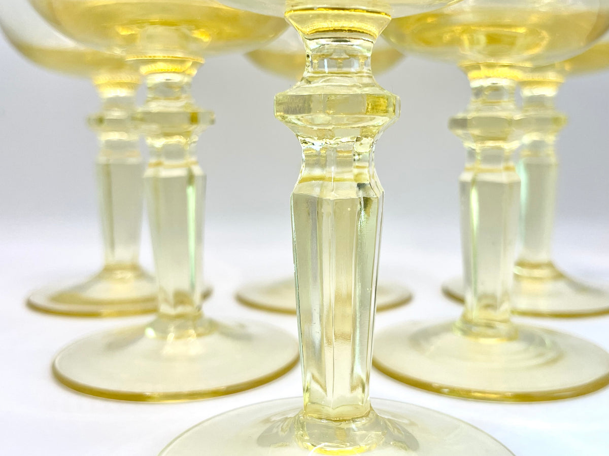 Six yellow wine glasses