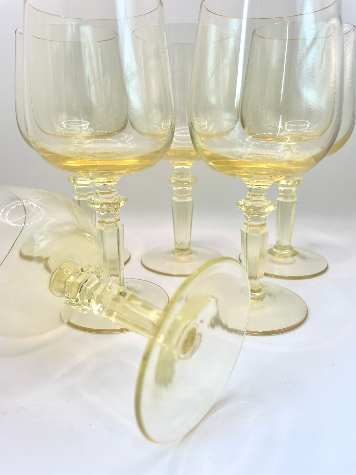 Six yellow wine glasses