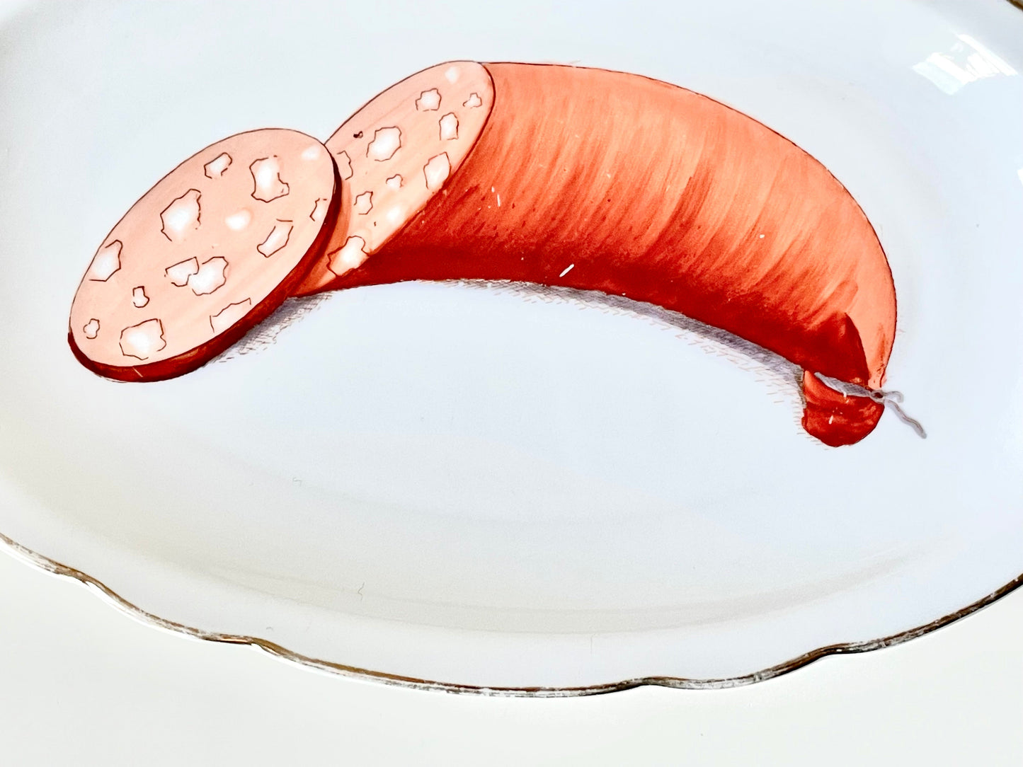 Langebraun platter with a hand-painted sausage