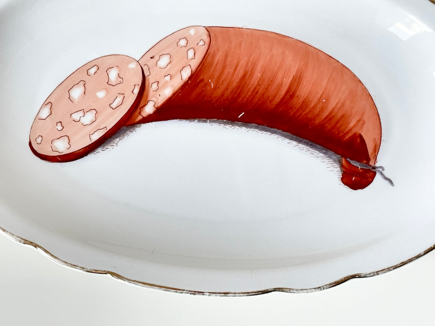 Langebraun platter with a hand-painted sausage